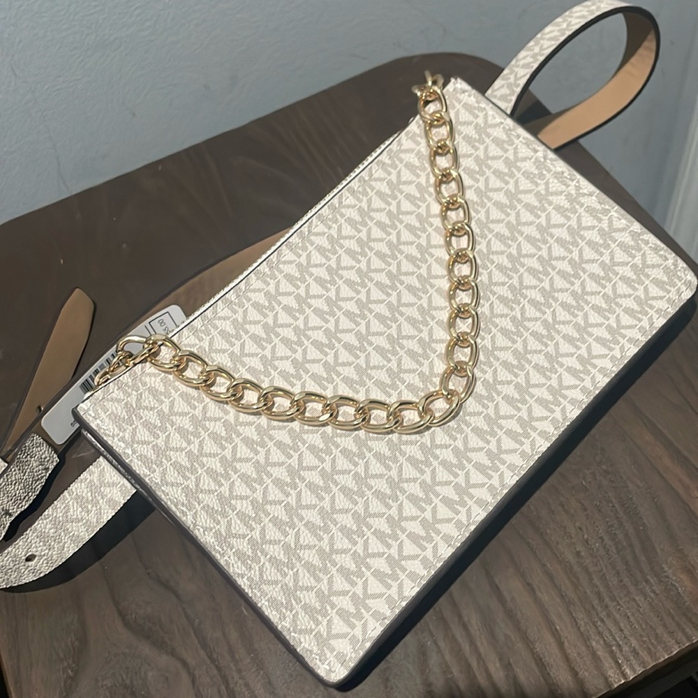 NWT. Michael Kors, belt bag. Straps reads size 8